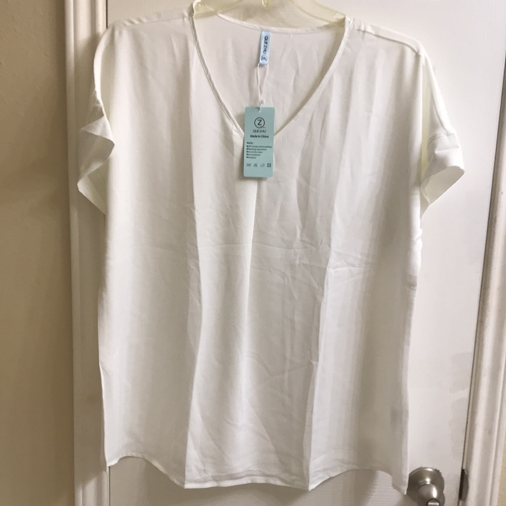 Que Zhu drop shoulder blouse with V-neck. NWT